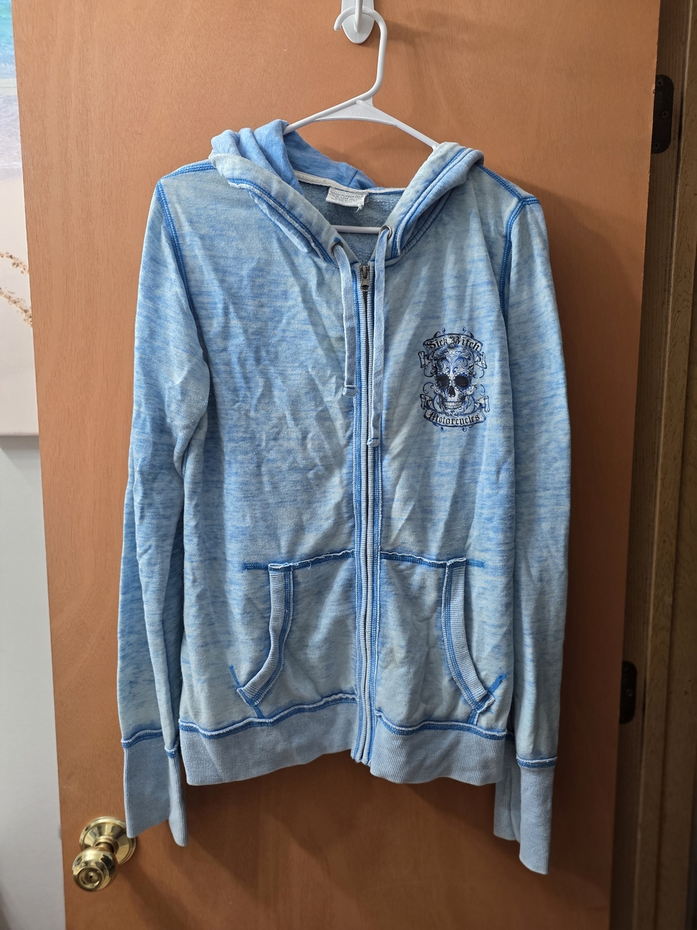 Women's Light Blue Zip-Up Hoodie with Skull Accent